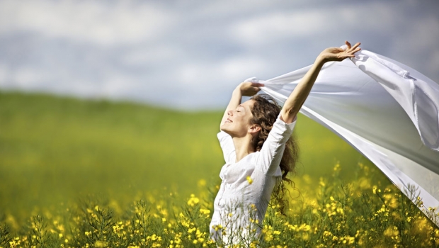 http://www.livehappy.com/sites/default/files/styles/article_featured/public/main/articles/Young-happy-woman-standing-in-field.jpg?itok=kll9dAub