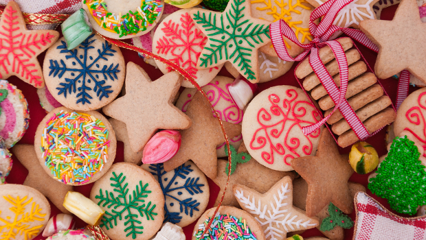 Colorful mix of Christmas-themed decorated cookies