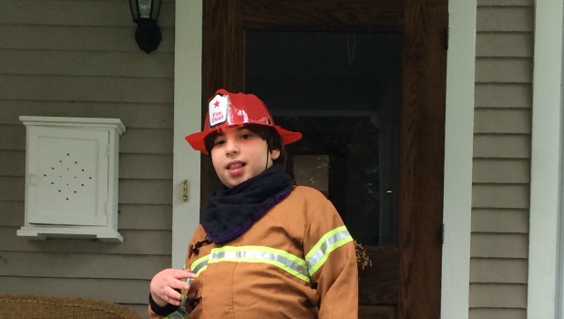 Max dressed as a fireman