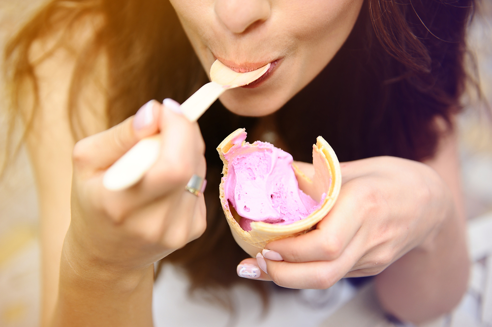 Woman savoring an ice cream cone