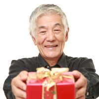 Old man gifting a present.