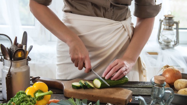 Woman cutting veggies