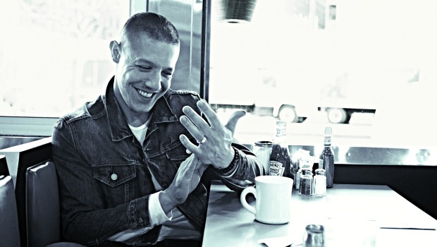 Actor Theo Rossi in a diner.
