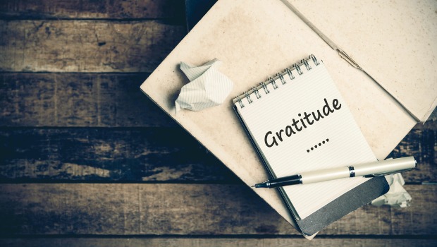 'Gratitude' written on a notepad